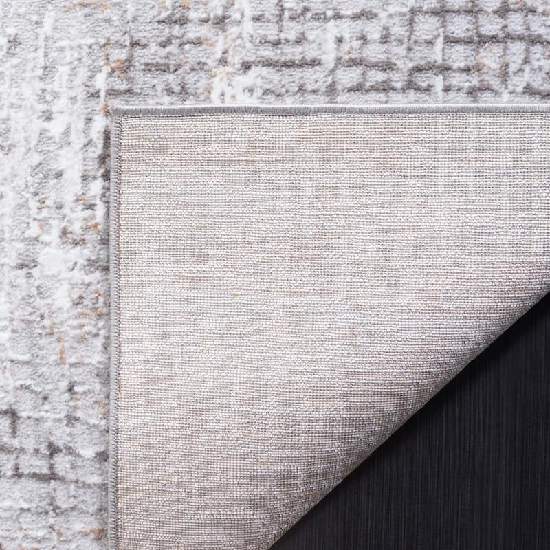 SAFAVIEH Parker Basra Modern Abstract Rug.