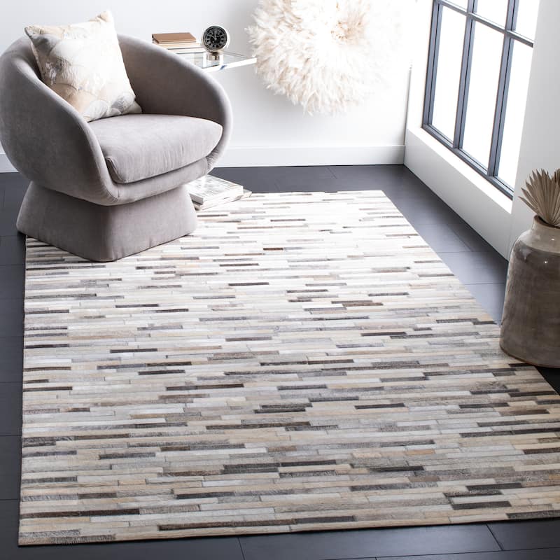 SAFAVIEH Handmade Studio Leather Carisa Natural Hide Leather Rug - 6' x 9' - Ivory/Grey
