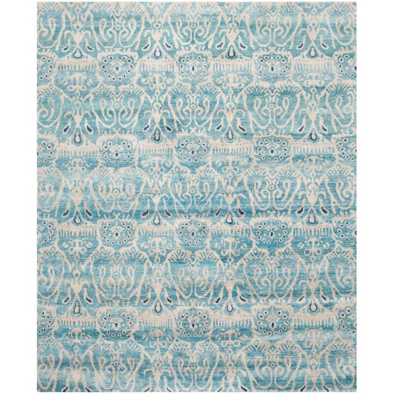 SAFAVIEH Couture Hand-Knotted Luxor Gudrin Banana Silk Rug