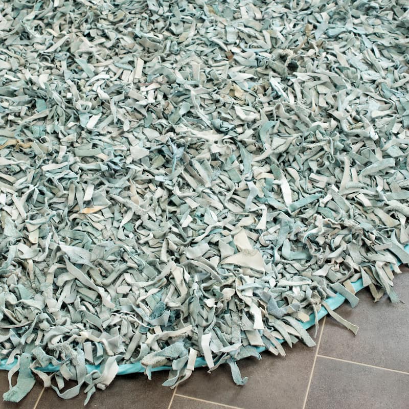 SAFAVIEH Handmade Leather Shag Carlijn Modern Leather Rug