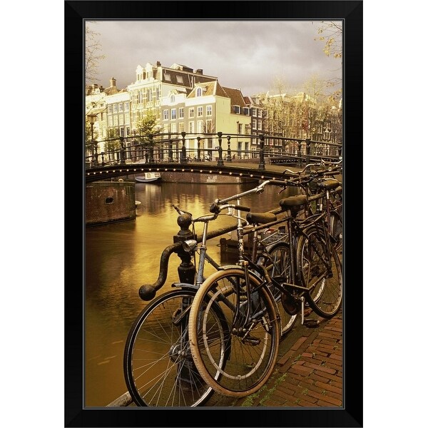 "Bicycles leaning by the railing of a Canal, Amsterdam" Black Framed Print