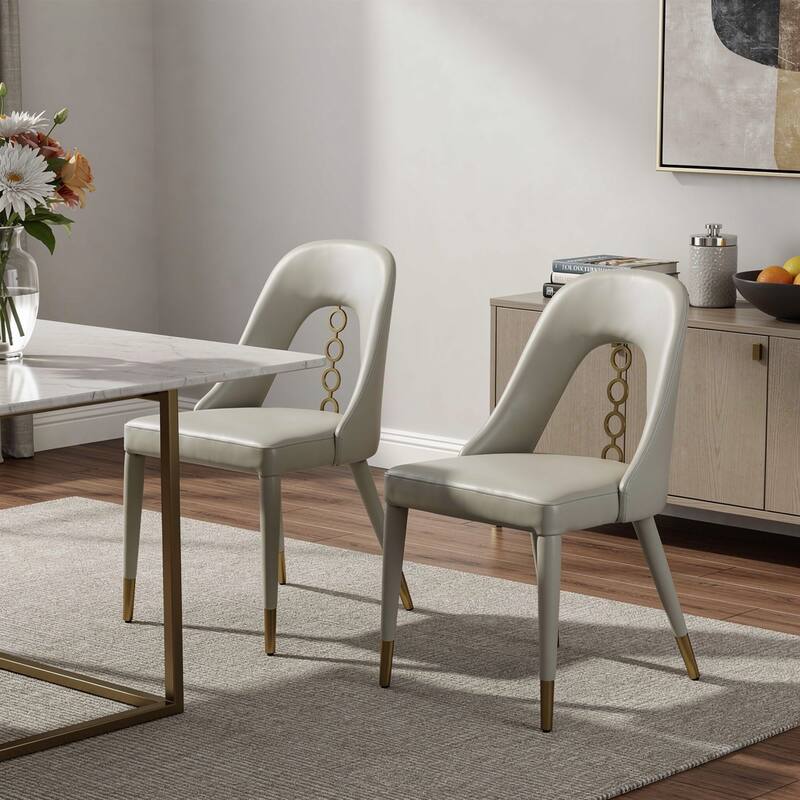 HomeRoots Set of Two Gray and Gold Faux Leather and Stainless Steel Dining Side Chairs - 19.00 in. x 34.00 in. x 22.00 in. - Set of 2 - 19.00 in. x 34.00 in. x 22.00 in. - Light Gray
