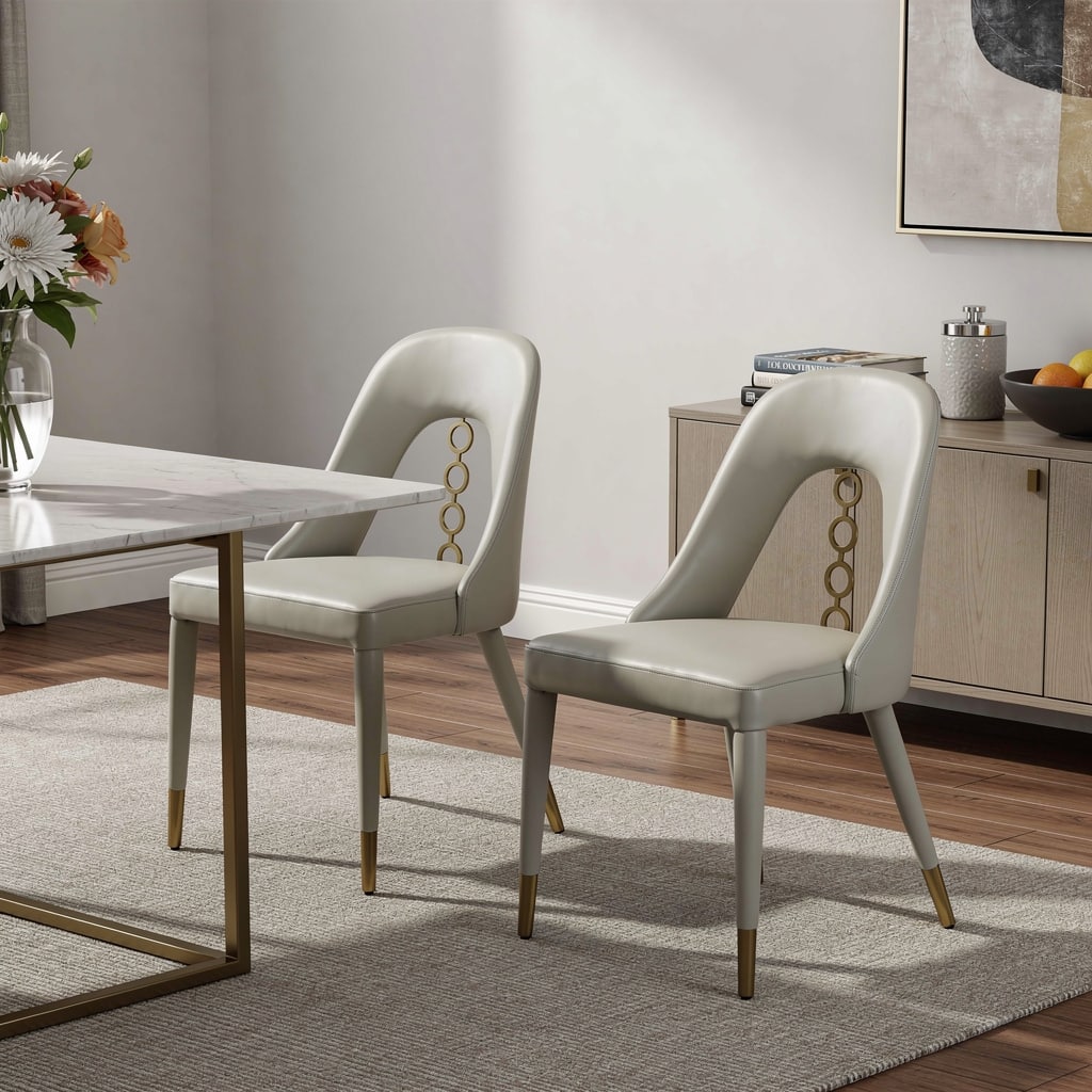 HomeRoots Set of Two Gray and Gold Faux Leather and Stainless Steel Dining Side Chairs - 19.00 in. x 34.00 in. x 22.00 in.