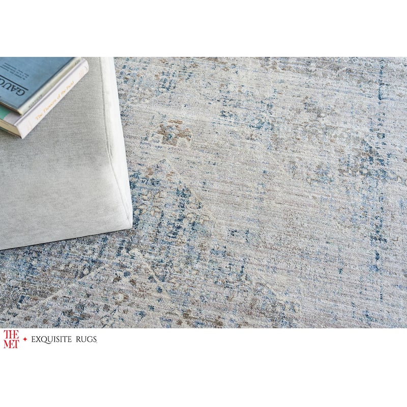 The Met X Exquisite Rugs Vintage Looms Beige/Blue Area Rug.