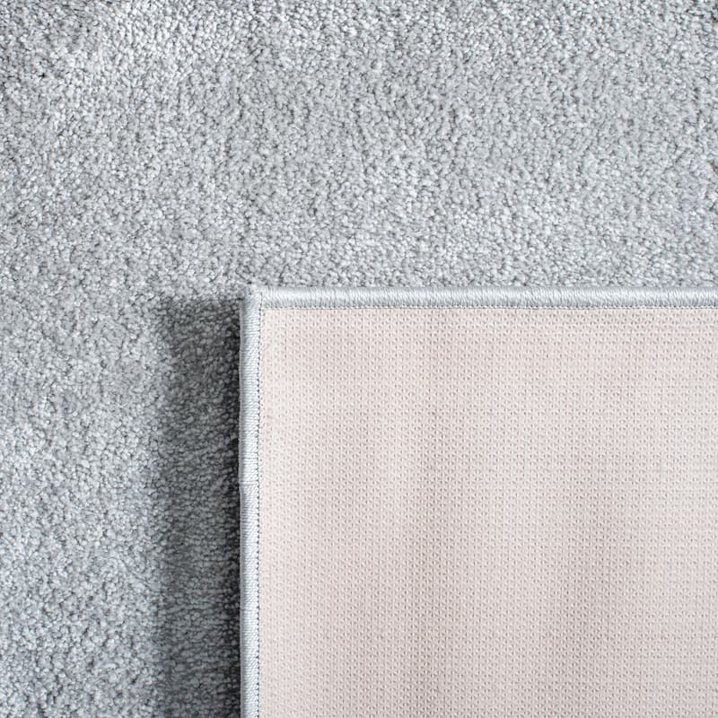 SAFAVIEH, Nonskid Gunde Solid Rug