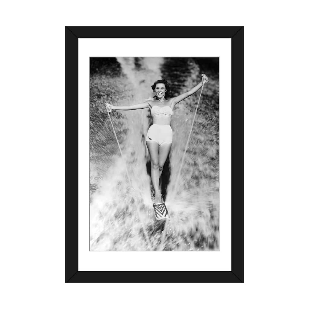 iCanvas "1950s Smiling Woman In White Two Piece Bathing Suit Aquaplaning Water Skiing Looking At Camera" by Vintage Images