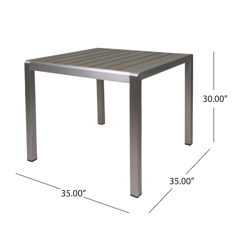 Cape Coral Outdoor 4-Seater Aluminum and Faux Wood Dining Set by Christopher Knight Home