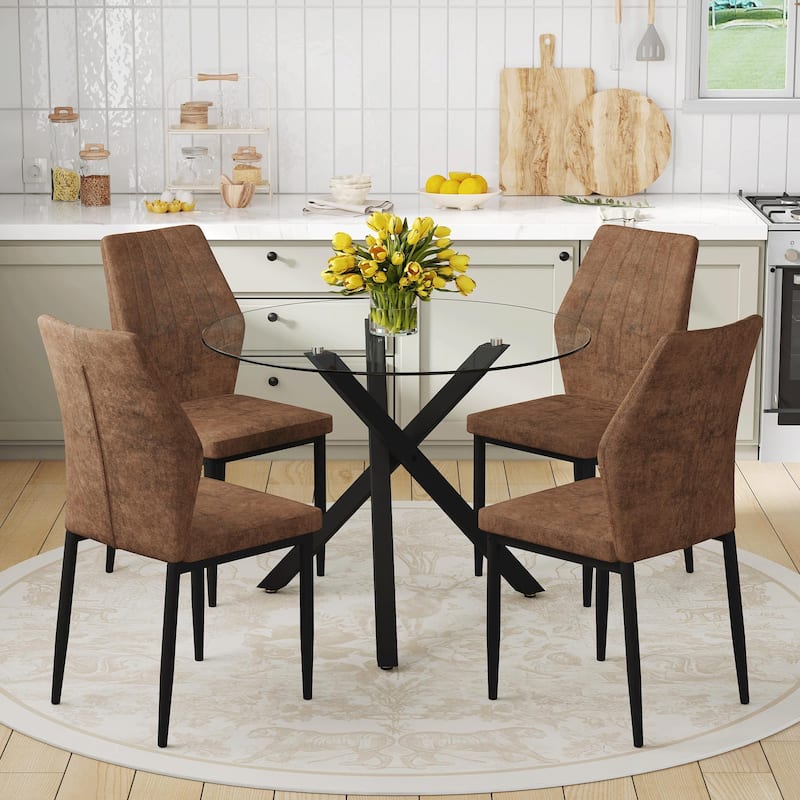 Table and chair set.Modern glass round table: X-shaped black metal bracket. Paired with 4 Dining Chairs