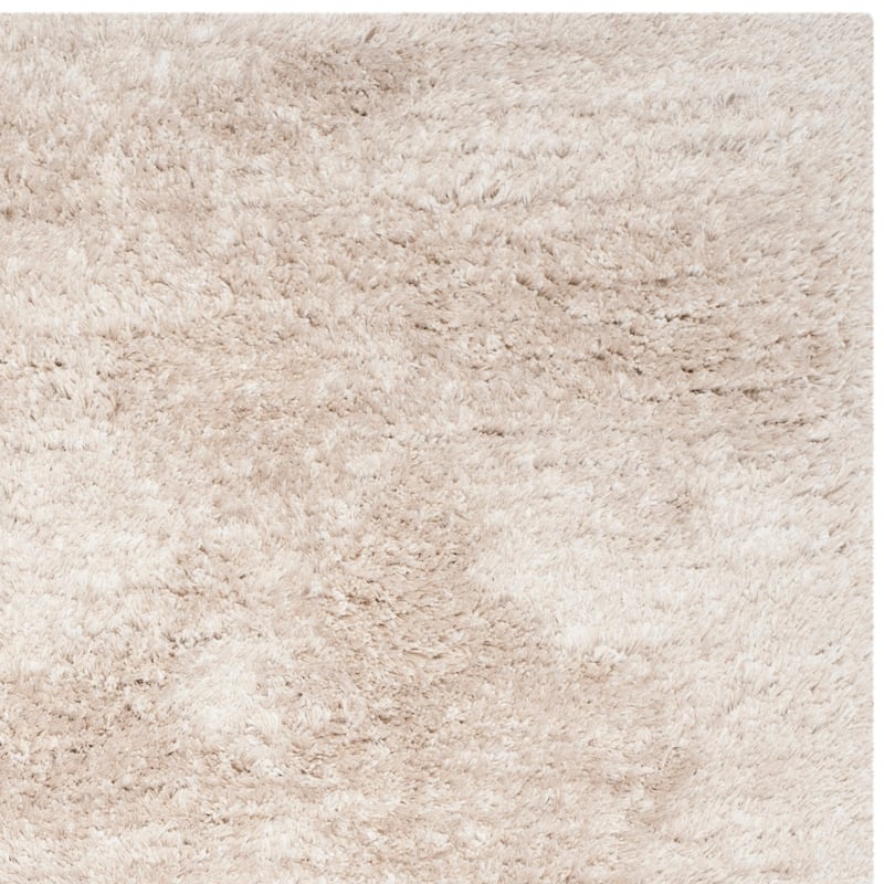 SAFAVIEH Handmade South Beach Leonella Shag Solid Polyester Rug