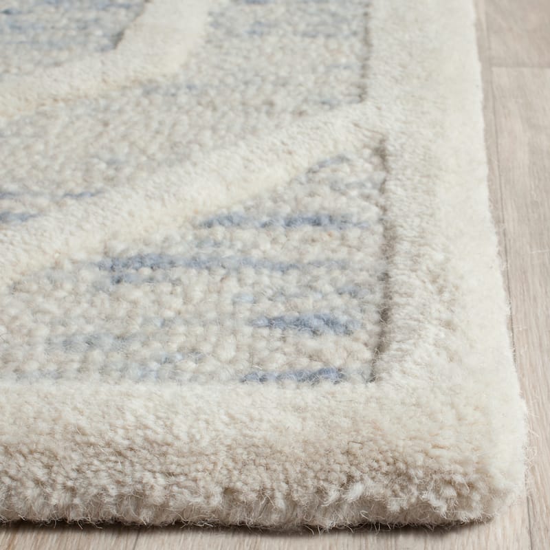 SAFAVIEH Handmade Cambridge Irmelinde Modern Wool Rug