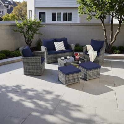 6-Piece Outdoor Wicker Conversation Set with Ottomans and Glass Coffee Table, Cushioned Seating