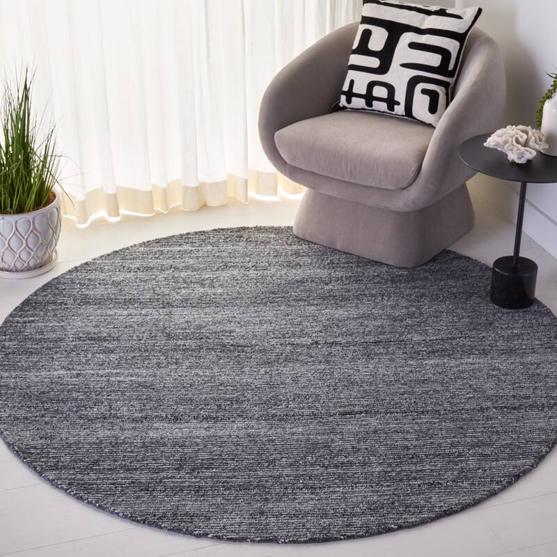 SAFAVIEH Handmade Mirage Adelie Modern Rug - 6' Round - Dark Grey/Ivory