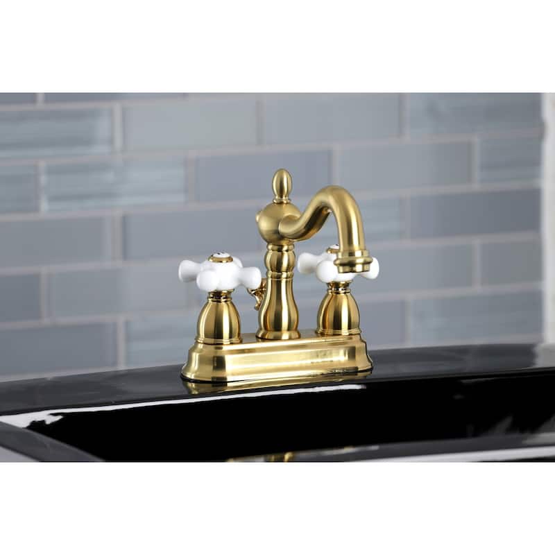 Kingston Brass Heritage Two-Handle 3-Hole Deck Mount 4 in. Centerset Bathroom Faucet