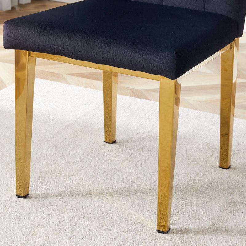 2 piece dining chairs.The gold metal legs complement the black velvet,showcasing a perfect blend