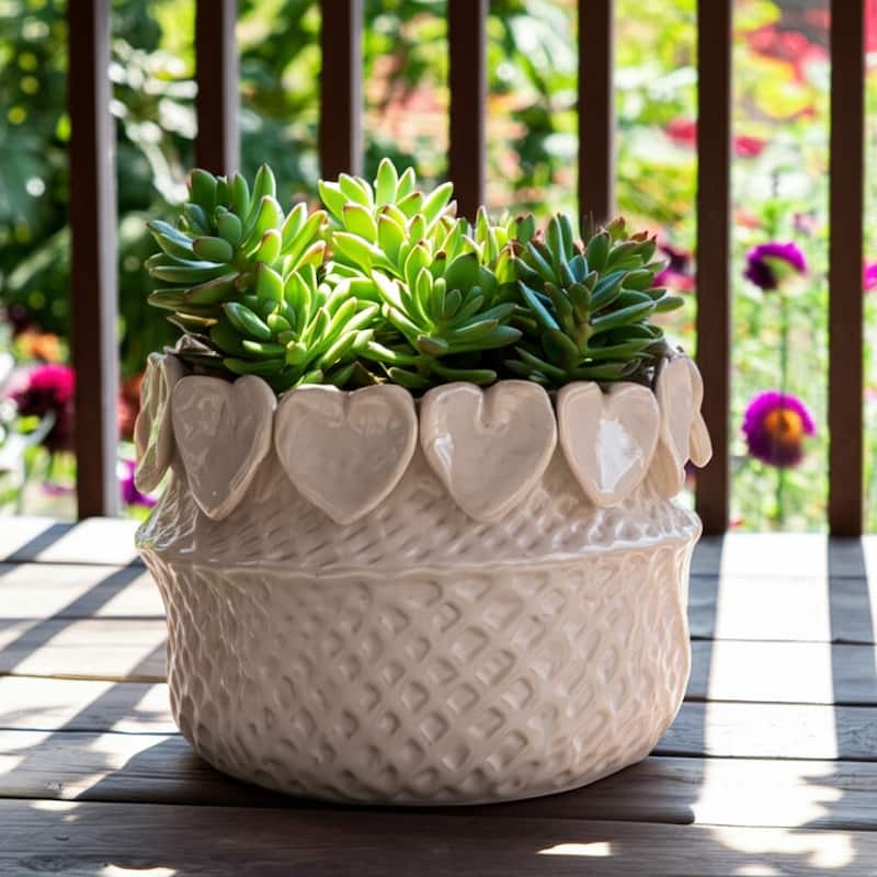 Stylish Ceramic Planter with Sculptural Leaf Heart Details