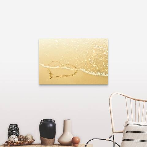 "Heart in sand washed away by waves" Canvas Wall Art