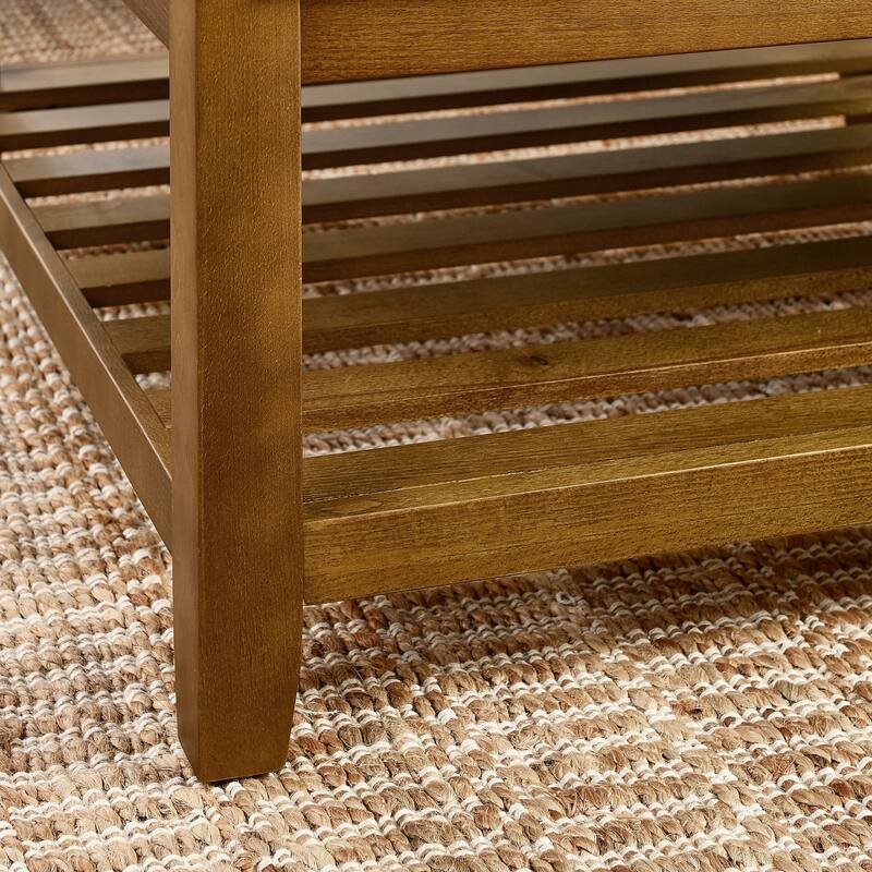Coffee table with tufted linen upholstery
