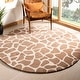 preview thumbnail 3 of 15, SAFAVIEH Handmade Soho Tirtsah Giraffe N.Z. Wool Rug 6' x 6' Round - Beige/Brown