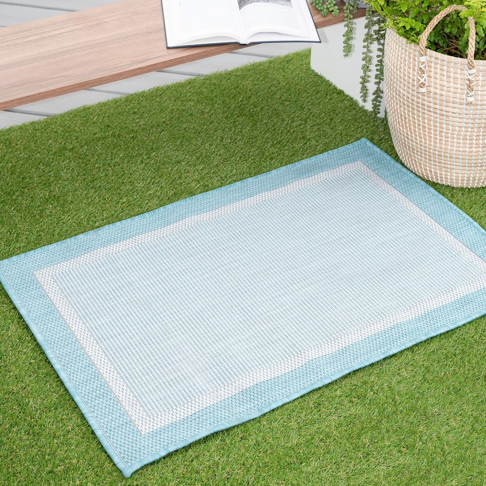 Exo Coastal Border Indoor/Outdoor Area Rug