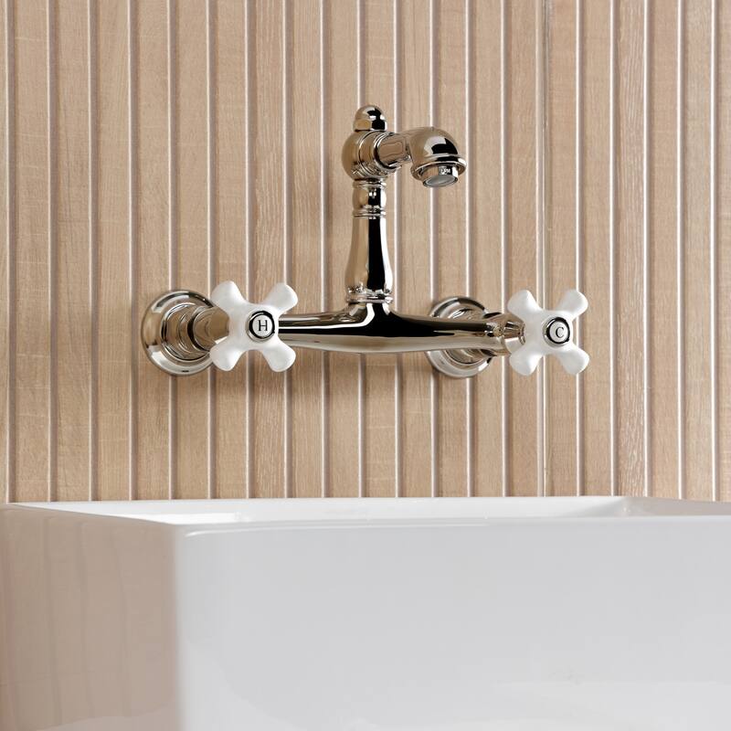 Kingston Brass English Country Two-Handle 2-Hole Wall Mount Bathroom Faucet