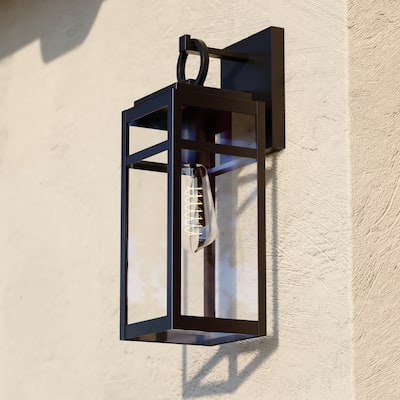 Hubbard 1 Light Dusk to Dawn Textured Black Outdoor Wall Lantern Clear Glass Shade