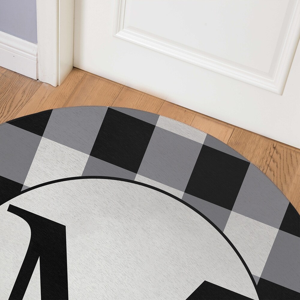 https://ak1.ostkcdn.com/images/products/is/images/direct/663235f671641bdc291b1636b847bc93e15f8a34/MONO-BLACK-%26-WHITE-M-Indoor-Floor-Mat-By-Kavka-Designs.jpg