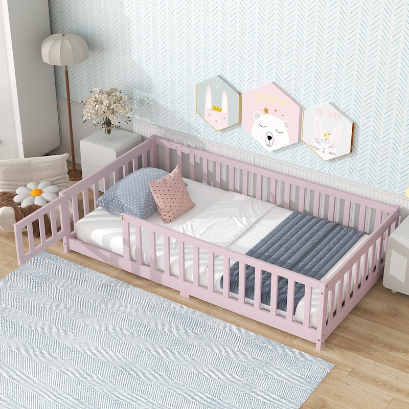 Twin Size Rubber Wood Floor Bed with Fence, Door & Safety Guardrails - Pink