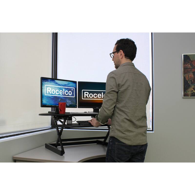 Rocelco 46 in. W Black Height Adjustable Corner Standing Desk Converter with Anti Fatigue Mat and Dual Monitor Riser Platform