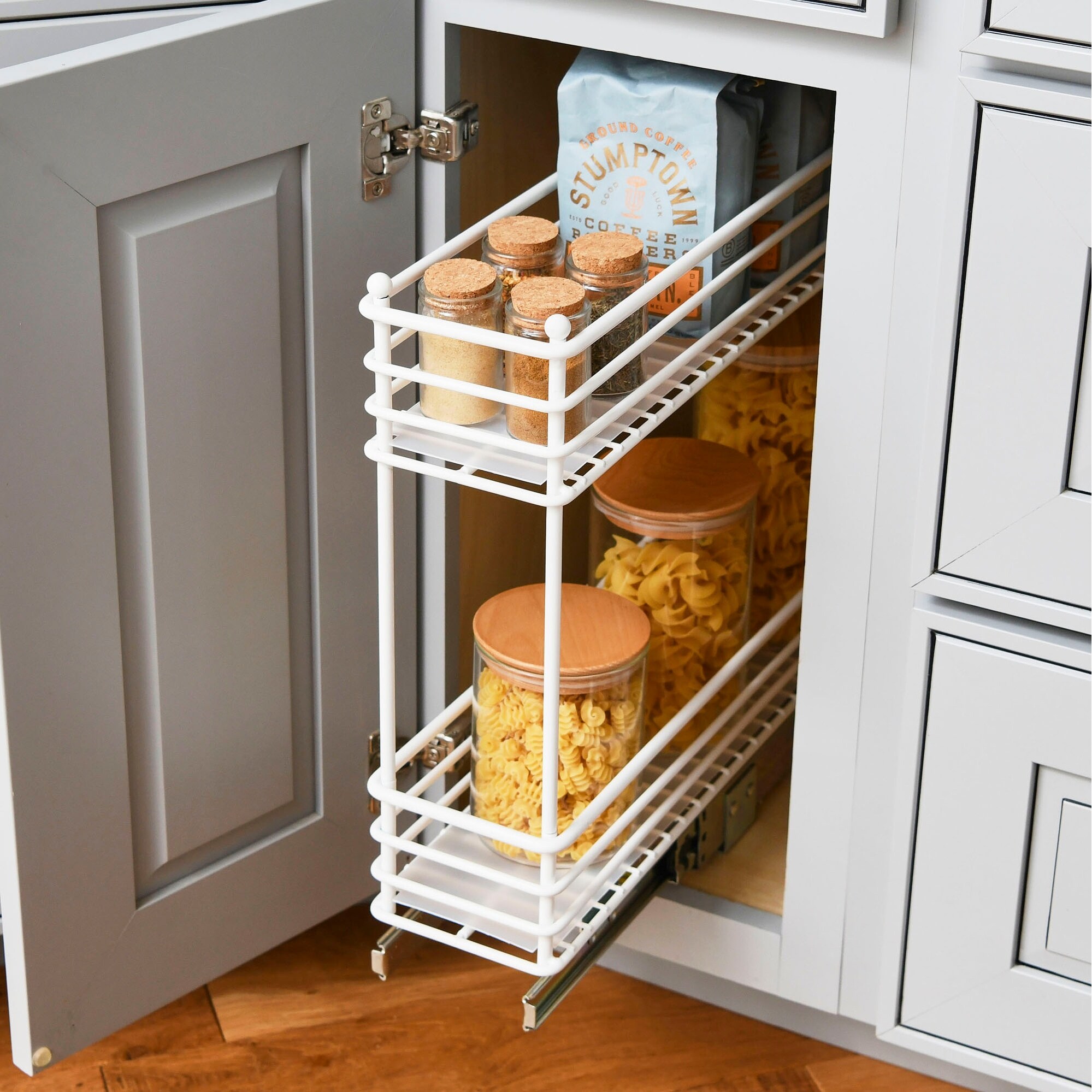 https://ak1.ostkcdn.com/images/products/is/images/direct/669b1b5a74cebcc46952c3b6e3cdfd1b255398f5/Narrow-Two-Sliding-Cabinet-Organizer%2C-Great-for-Slim-Cabinets-in-Kitchen.jpg