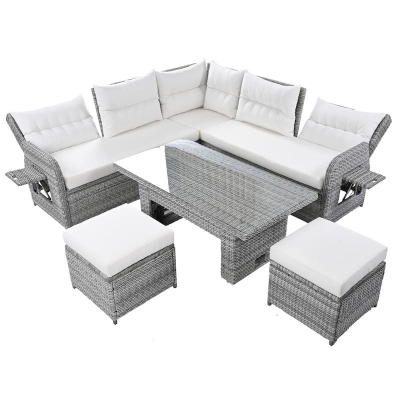 Patio Rattan Furniture Set with an Adjustable Table, Recliners with Extendable Side Tables, and Two Ottomans.
