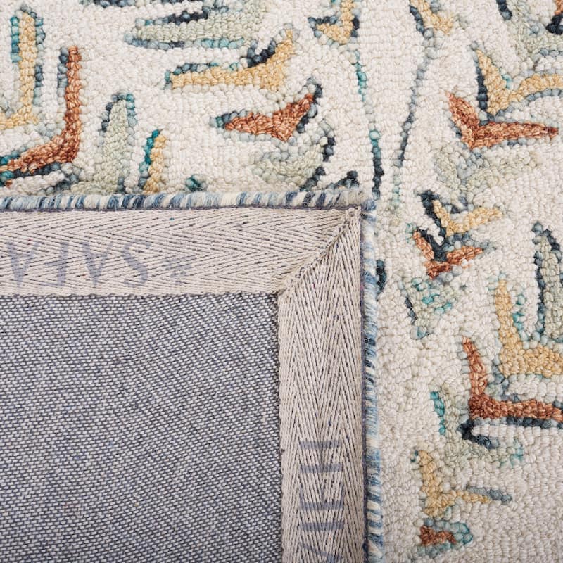 SAFAVIEH Handmade Capri Ilianka Wool Rug