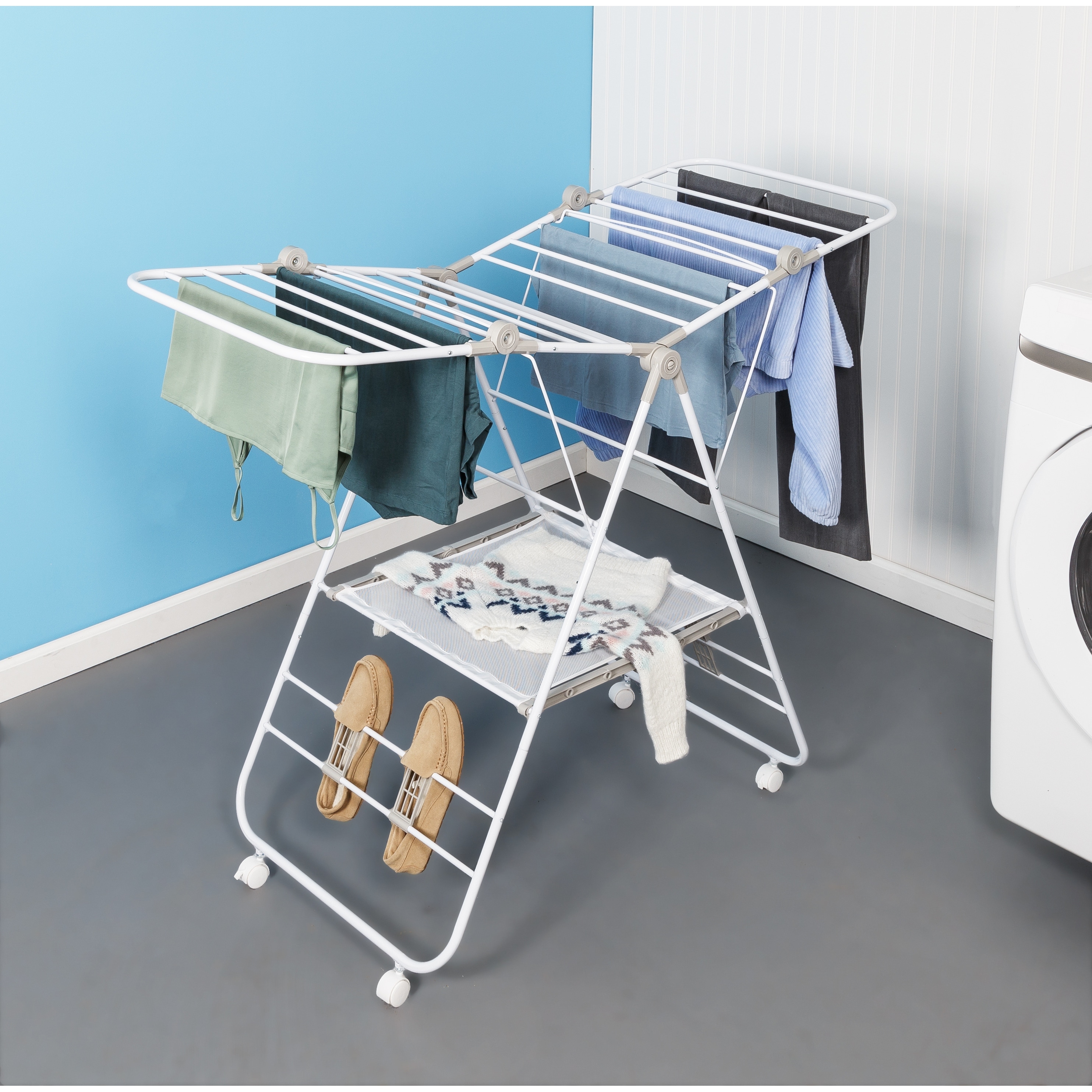https://ak1.ostkcdn.com/images/products/is/images/direct/66c0f6bd065f2ee821360a7722514212063c5296/White-Folding-Wing-Clothes-Drying-Rack-with-Wheels.jpg
