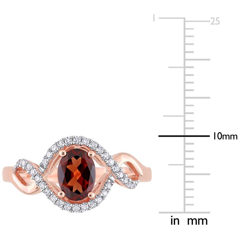 Miadora 10k Rose Gold Garnet and 1/6ct TDW Diamond Halo Infinity Ring