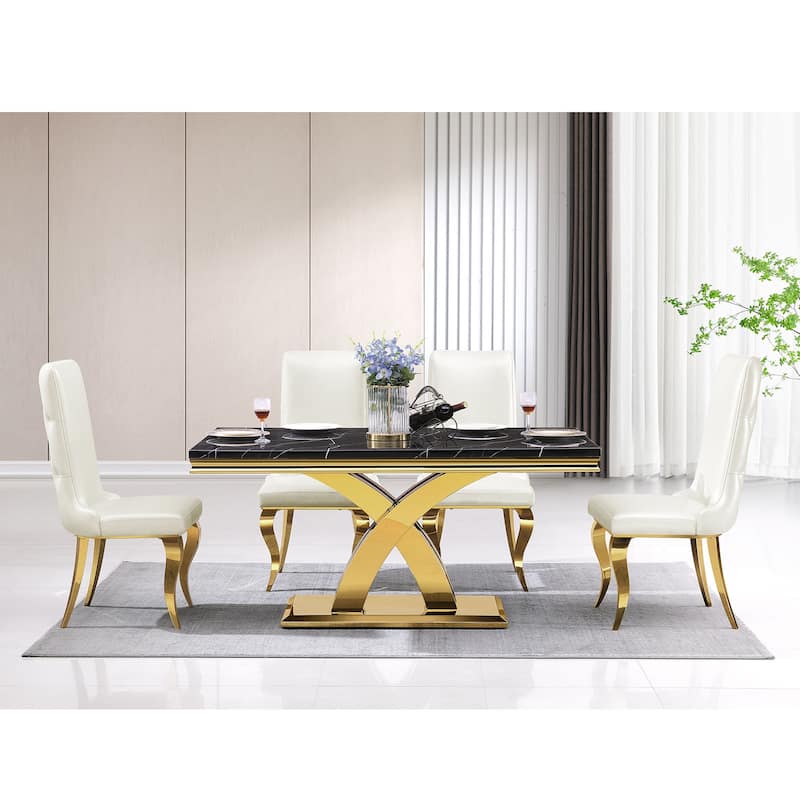 White leather dining chairs with gold legs
