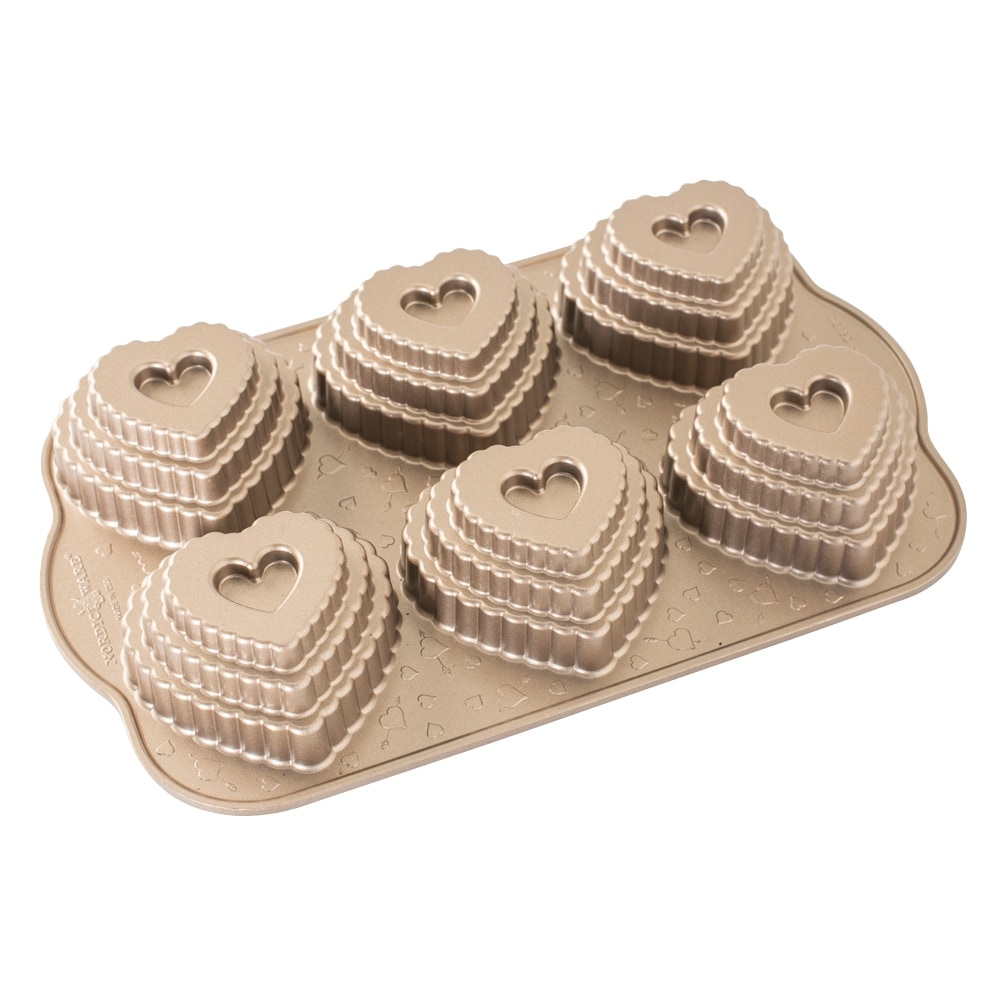 https://ak1.ostkcdn.com/images/products/is/images/direct/66fd51de25037074b01ed0d9ab9b188929a64e54/Nordic-Ware-Tiered-Heart-Cakelet-Pan.jpg