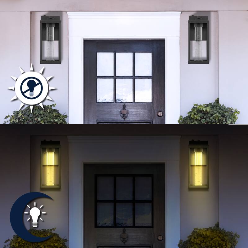 Justina 4.75" 1-Light Industrial Iron/Seeded Glass with Dusk-to-Dawn Sensor Integrated LED Outdoor Sconce, Black by JONATHAN Y