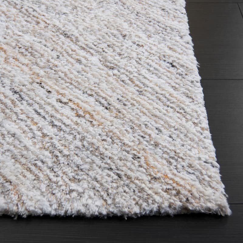 SAFAVIEH Handmade Glory Shag Stergiani Rug