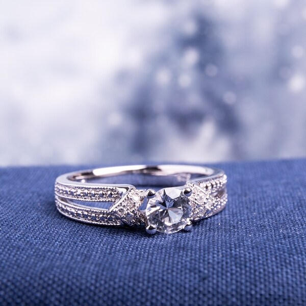 Miadora Sterling Silver Created White Sapphire and Diamond Accent Split Shank Engagement Ring. Opens flyout.