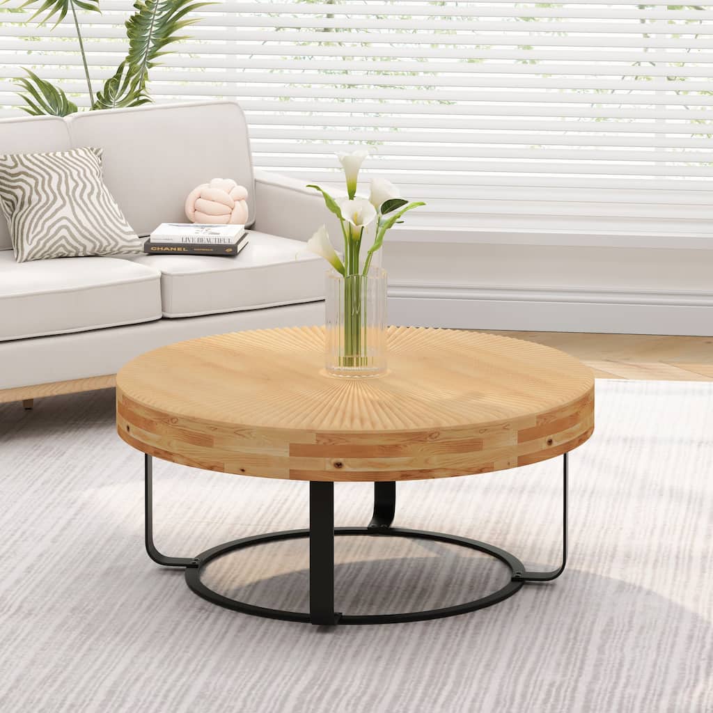 Modern round coffee table with metal legs