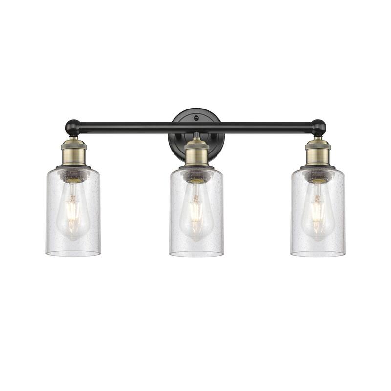 Innovations Lighting 616-3W-11-22 Clymer Vanity Clymer 3 Light 22" - Black Antique Brass / Seedy