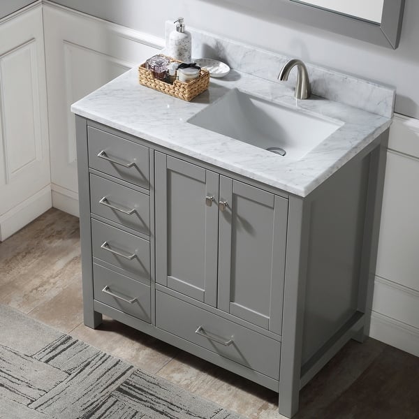 https://ak1.ostkcdn.com/images/products/is/images/direct/67a4ff1d82b06136fc8e664b3e58c3c318e45ee9/BATHLET-36-inch-Grey-Bathroom-Vanity-Set-with-Carrara-Marble-Top.jpg?impolicy=medium