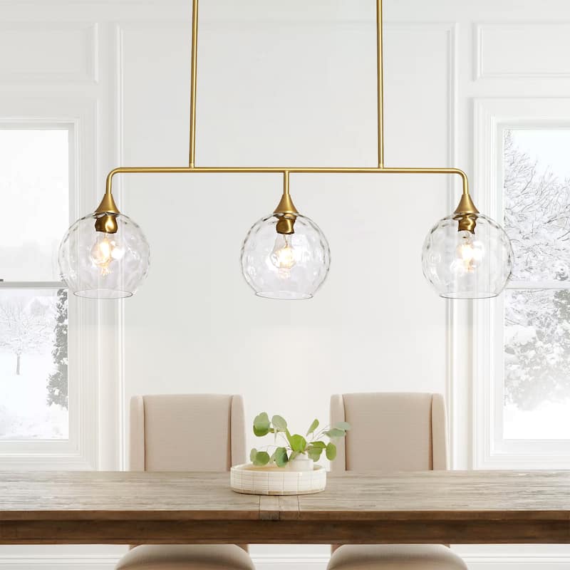 3-Light Modern Black/Brushed Gold Linear Chandelier for Kitchen Island with Clear Textured Glass Globe Shades - Clear/Gold