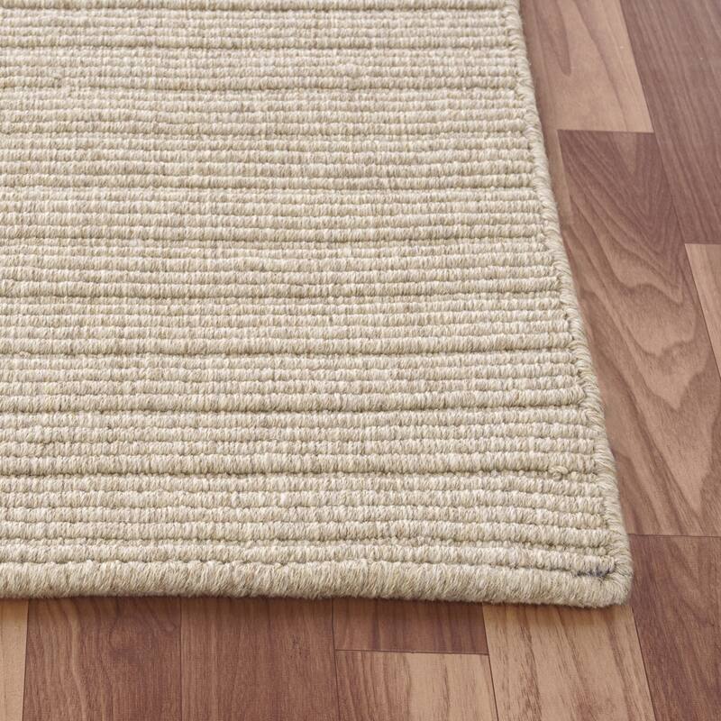 Sevita Solid Casual Hand-Woven Woolen Area Rug