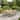 Expandable Wooden Patio Dining Set with 8 PE Twist Rattan Wicker Iron Frame Chairs, Extendable Rectangular Outdoor Dining Table