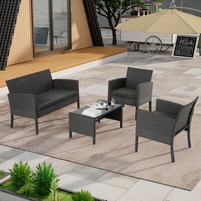 Modern 4-Piece Outdoor Wicker Patio Set with Glass Top Coffee Table
