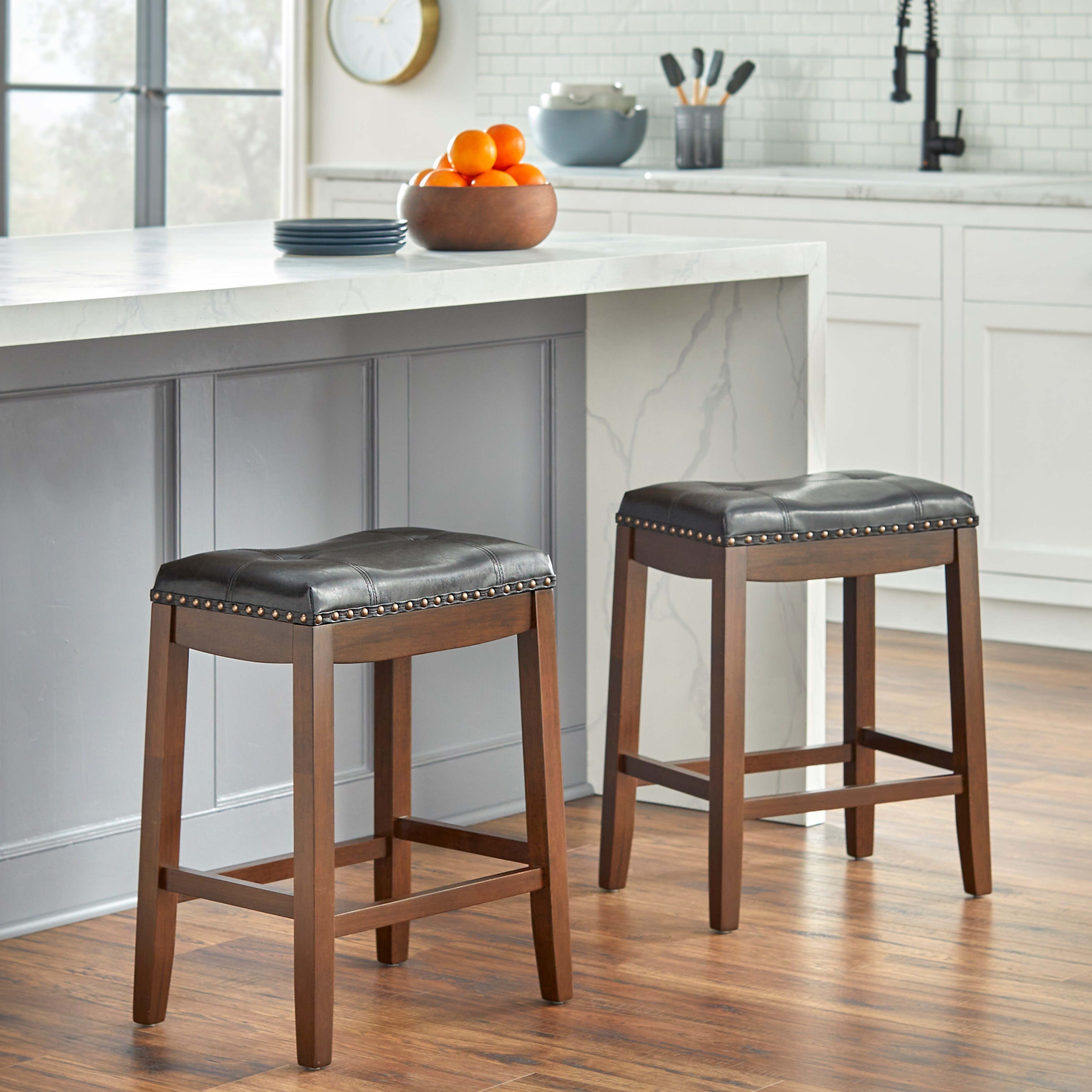 Padded saddle clearance bar stools