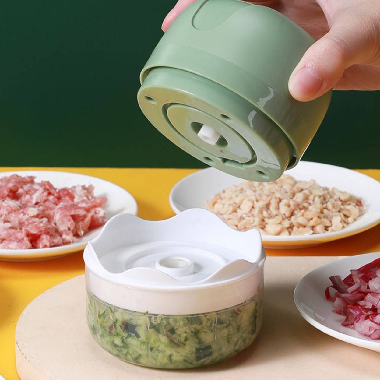 https://ak1.ostkcdn.com/images/products/is/images/direct/68147db2de79eb984438c923033cd88a035e96ef/Electric-Garlic-Press-Wireless-WaterProof-Plastic-Simple-Operation-Electric-Meat-Grinder-Kitchen-Tools.jpg
