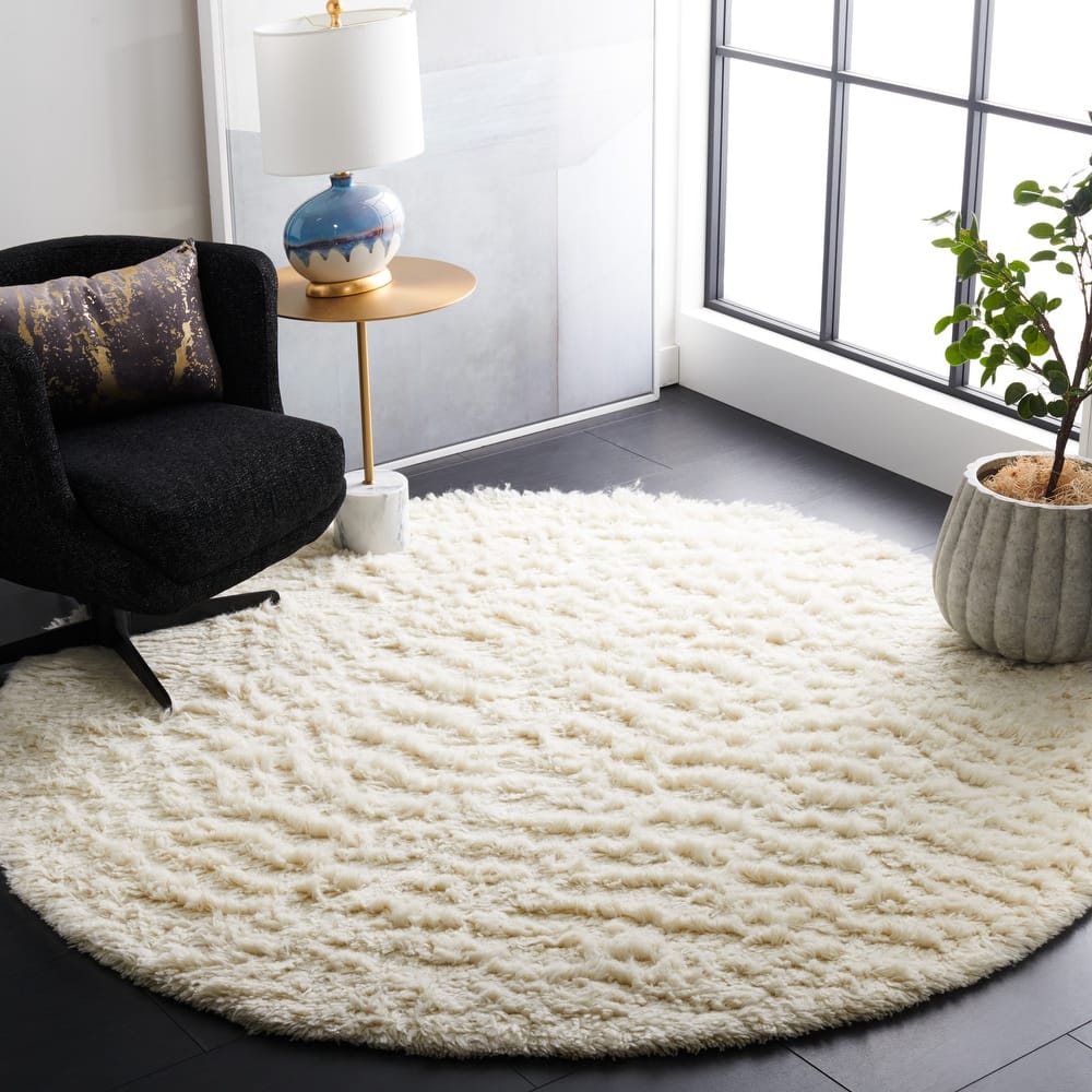 SAFAVIEH Handmade Flokati Jannine Shag Solid Wool Rug