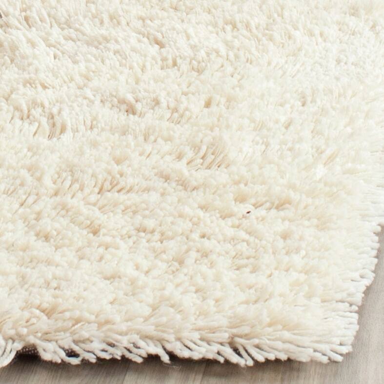 SAFAVIEH Handmade Classic Shag Nakhshun Rug