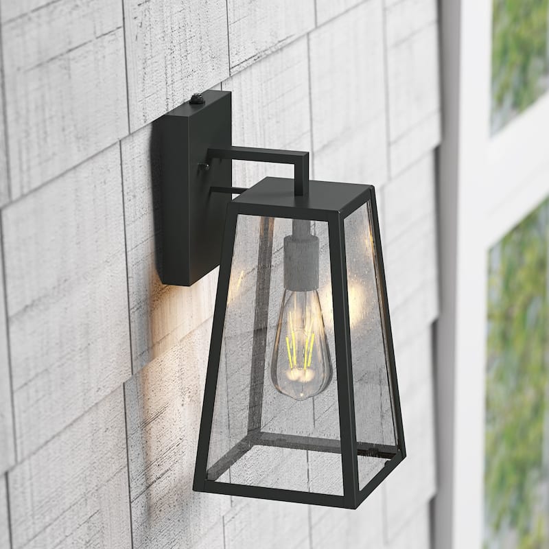 Concise 1-Light Dusk to Dawn Sensor Wall Sconce with Seeded Glass Design